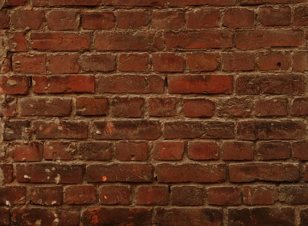 Brick wall with red brick, red brick background. Close up.
