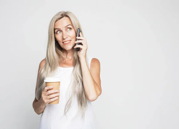 Happy Elderly Female Lomg Hair Has Pleasant Telephone Conversation Uses — Photo