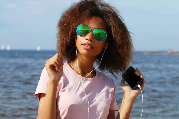 Young Afro American Young Woman Sunglasses Listening Music Headphones Her — Fotografia de Stock
