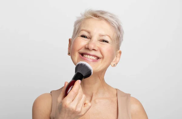 Beauty Portrait Mature Woman Applying Blush Makeup Brush Grey Background — Stock Photo, Image