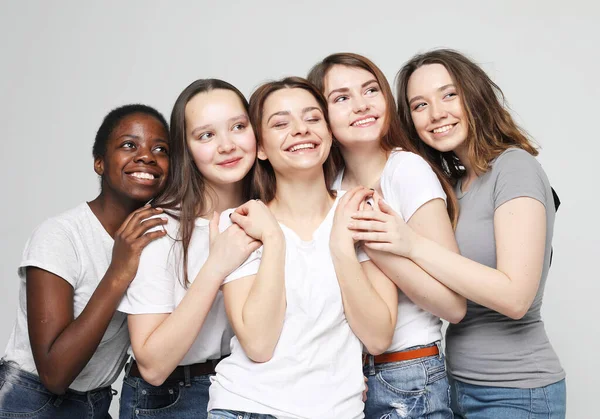 Group Five Young Female Friends Different Nationalities Grey Background — Stock fotografie