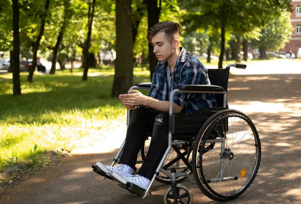 Young Disabled Man Wheelchair Walking Park Listening Music Lifestyle Concept — Stock Photo, Image