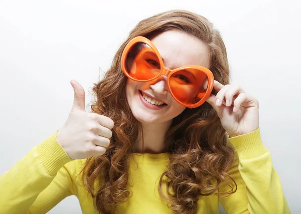 Funny Curly Woman Wearing Big Sunglasses Show Thumbs White Background — 图库照片