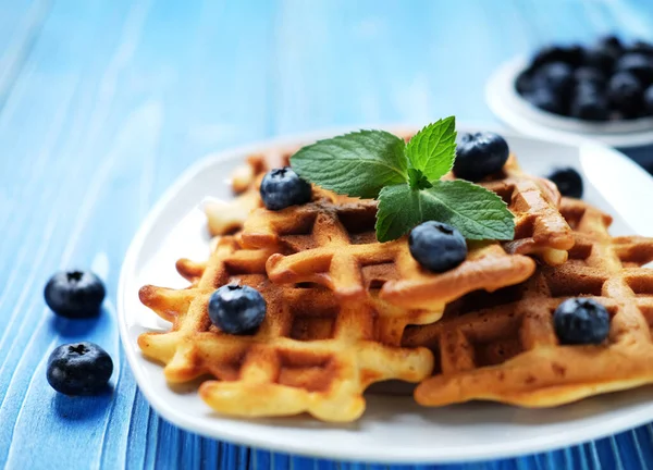 Waffles Blueberries Raspberries Breakfast White Plate Blue Wooden Table Close — Stock Photo, Image