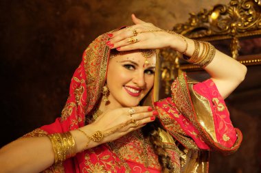 Beautiful indian woman dancer in the posture of Indian dance. Indian classical dance bharatanatyam .