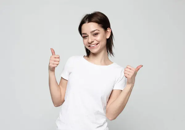 Happy Young Woman Giving Thumb Grey Background — Stock Photo, Image