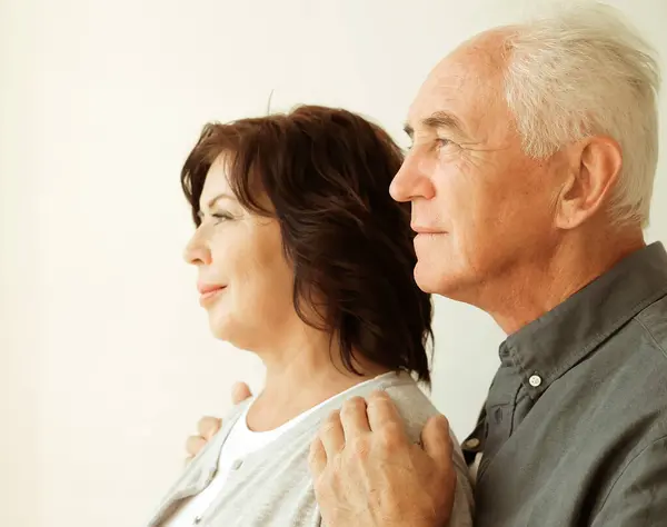 Portrait Cute Happy Caucasian Couple Retired Husband Wife Hugging Indoors Royalty Free Stock Images
