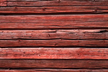 Kırmızı ahşap bir evin duvarı