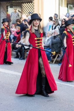 Palamos, Spain - february 19, 2023, Traditional carnival parade in a small town Palamos, in Catalonia, in Spain