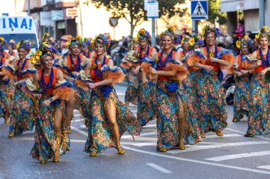 Palamos, Spain - february 19, 2023, Traditional carnival parade in a small town Palamos, in Catalonia, in Spain