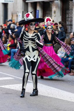 Palamos, Spain - february 19, 2023, Traditional carnival parade in a small town Palamos, in Catalonia, in Spain .