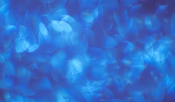 白ボケ味を持つ美しい青色の背景色 — ストック写真
