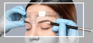 Permanent make-up for eyebrows of beautiful woman with thick brows in beauty salon. Closeup beautician doing tattooing eyebrow. Professional makeup and cosmetology skin care.