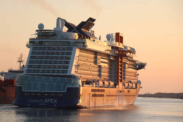 stock image IJmuiden, the Netherlands - May 14th, 2022: Celebrity Apex, operated by Celebrity Cruises, leaving Zeesluis Ijmuiden towards North Sea