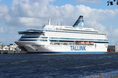 Velsen, the Netherlands - September 30th 2022: Tallink Silja Europa Ferry, moored in North Sea Canal temporary house asylum seekers and refugees. clipart