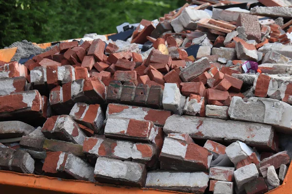 Old Demolished Bricks Orange Garbage Dumpster — Fotografia de Stock