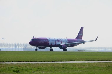 Amsterdam the Netherlands - April 2nd, 2017: TF-GPA WOW air Airbus A321-200 takeoff from Polderbaan runway, Amsterdam Airport Schiphol clipart