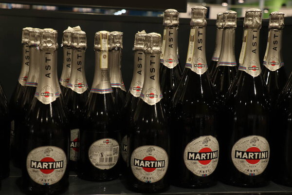 Beverwijk, the Netherlands - June 8th 2024: Asti Martini bottles in store, a sparkling Italian white wine from Piemonte.