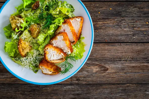 Caesar Salad Fried Chicken Breast Vegetables Wooden Table Stock Image
