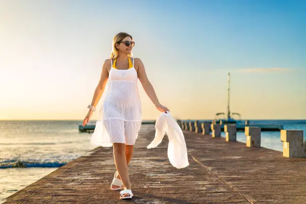 Happy Mid Adult Woman Walking Pier ロイヤリティフリーのストック画像