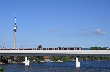 Subway and Donauturm Vienna cityscape