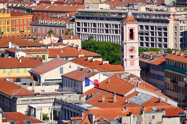 French flag and church tower in Nice France