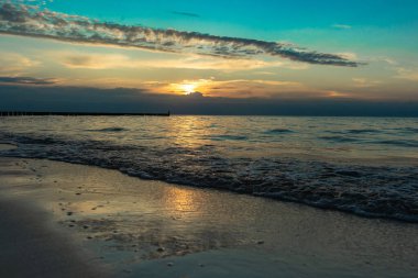 Polonya 'da Baltık Denizi' nde gün batımı
