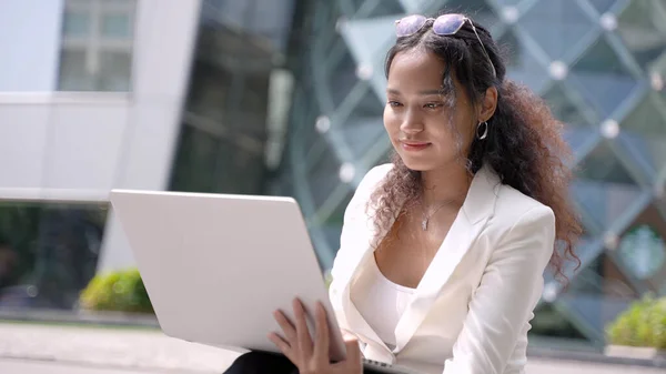 Portrait Young Asian Business Woman While Working Laptop Sitting Outdoors Royalty Free Stock Photos