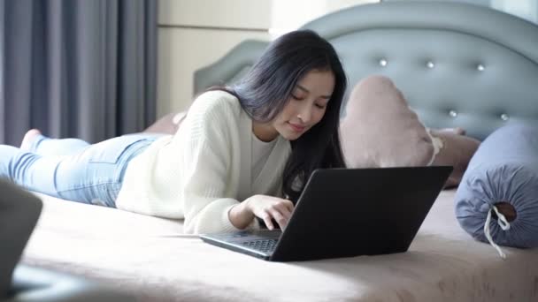 Relaxed Asian Woman Enjoying Wireless Technology Cozy Home Indoor Setting — Stock Video