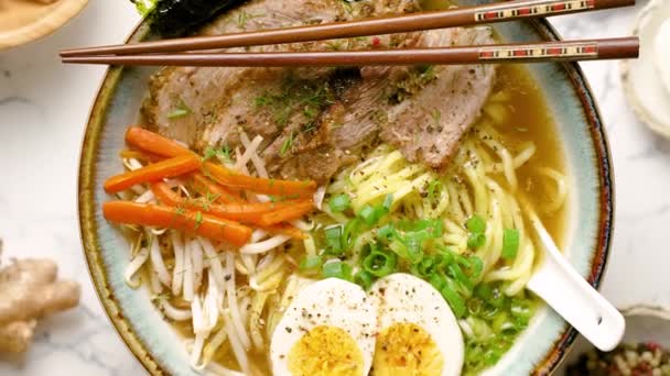 Miso Ramen Asian Noodles Egg Pork Carrot Mushrooms Bowl White — Stock Video