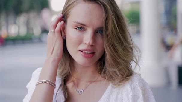Woman Long Hair White Shirt Necklace Happily Looking Camera — Stock Video