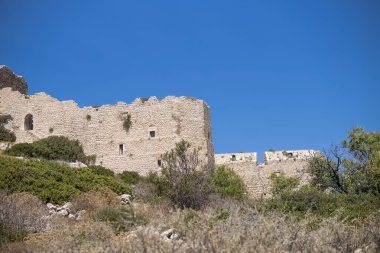 Ruins of Kritinia Castle at the shore of Mediterranean Sea at Rhodes Island