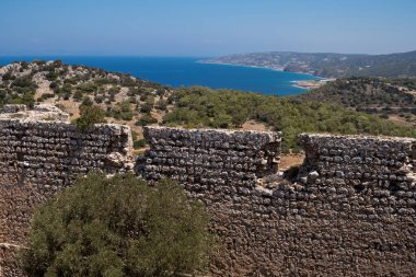 Ruins of Kritinia Castle at the shore of Mediterranean Sea at Rhodes Island