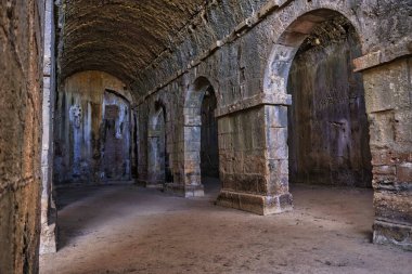 the interior of ancient  Roman Cisterns of Aptera in which water was stored clipart