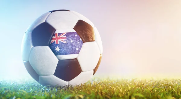 Football soccer ball with flag of Australia on grass. Australian national team