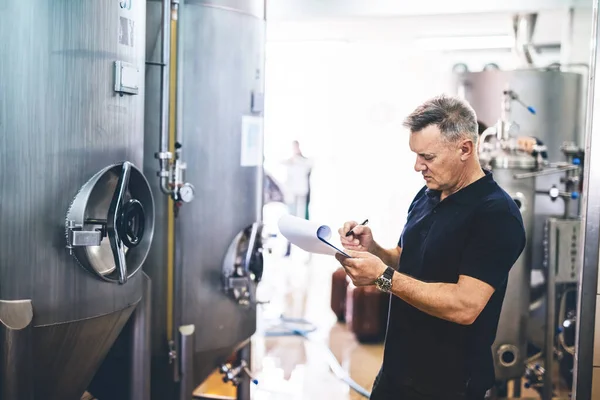 Manager Brewery Inspecting Equipment Producing Craft Beer Middle Aged Man — Stock fotografie