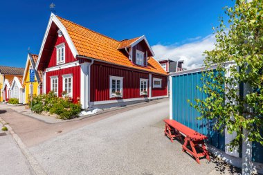 Scandinavian style houses in colored wood in Karlskrona Sweden. clipart