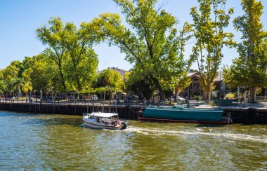 Tigre, Argentina - February 21, 2023: Maritime transport in El Tigre port.