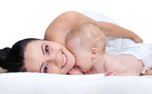Gelukkig Moeder Met Baby Een Licht Achtergrond — Stockfoto