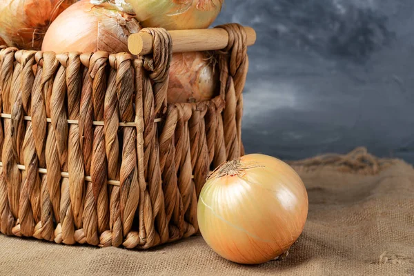Onions Wicker Basket Close Space Text — Stock Photo, Image