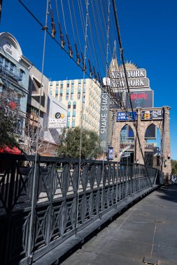 replica of the iconic Brooklyn Bridge in front of the New York New York New York  Hotel and Casino on the Strip in Las Vegas, Nevada.