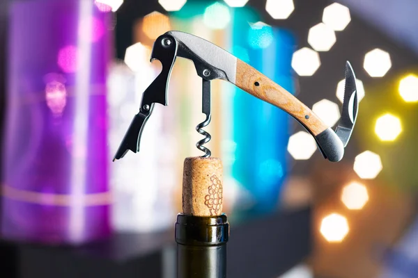 Corkscrew Neck Wine Bottle Cork Background Multi Colored Lights Blurred — Stock fotografie
