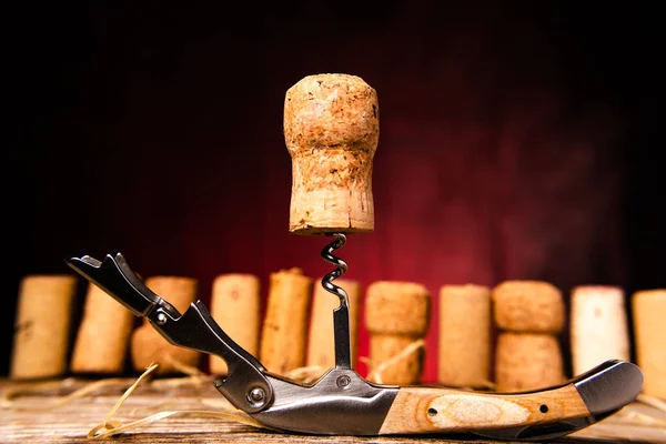 Sommelier Knife Wine Cork Close Background Used Corks Wooden Table — Stock fotografie