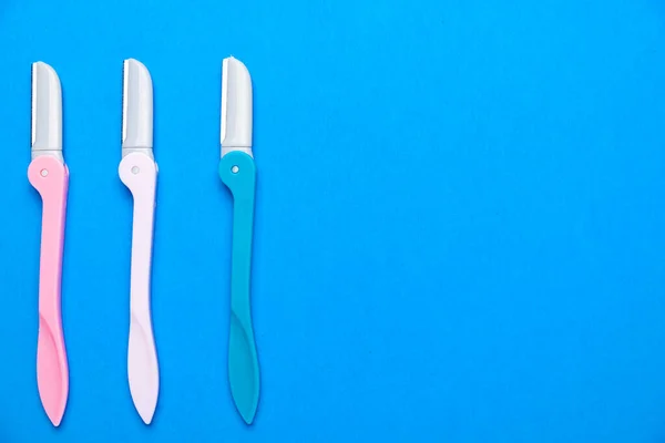 Women Razors Plastic Handles Different Colors Blue Background Space Text — Φωτογραφία Αρχείου