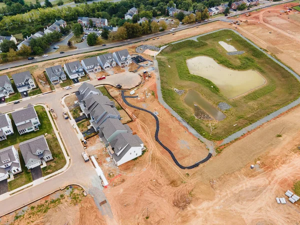 Stock image Construction site with new houses and prepared place for construction.