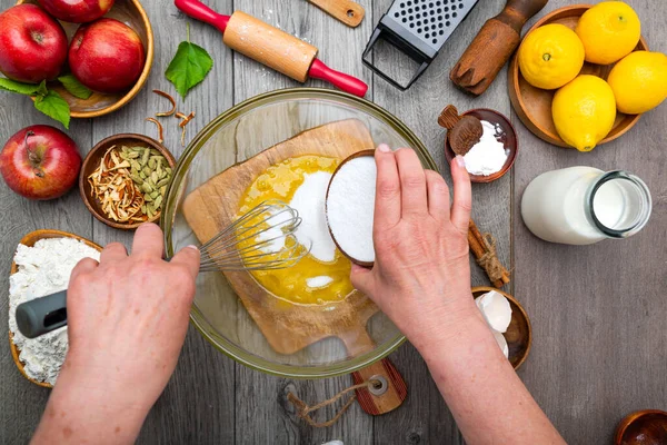 Cook Hands Adding Sugar Glass Bowl Whisk Cooking Pie Dough — Stock Photo, Image