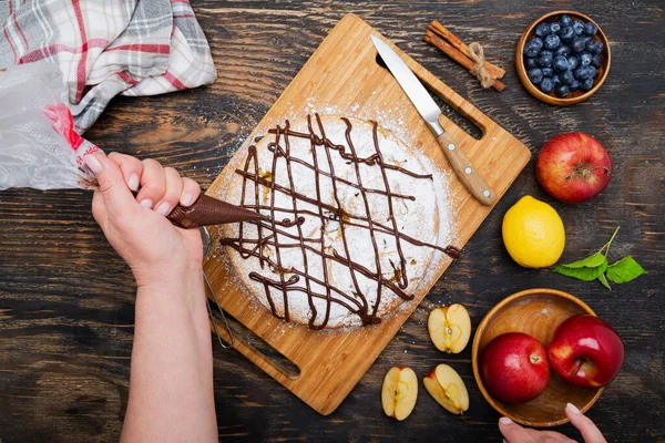 Confectioner Decorates Apple Pie Chocolate Bag View — Stock Photo, Image