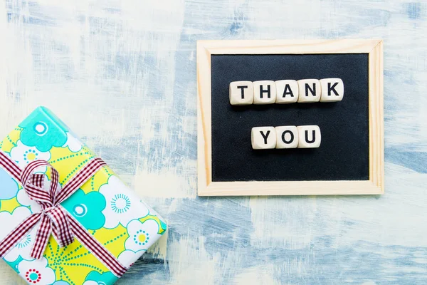 Top View Wooden Cubes Thank You Inscription Black Board Gift — Stock Photo, Image