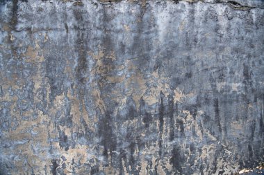 Arka plan ya da doku olarak eski püskü kirli beton duvar, kahverengi gri paslı vintage