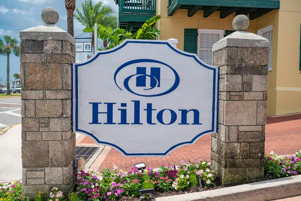 stock image hilton hotel logo. on a stone gate in St. Augustine USA. hospitality company with representative offices in different countries